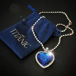 Heart Of The Ocean Silver Necklace Blue Gold Titanic Velvet Pouch Vintage Retro. Fixed Price $13.46.