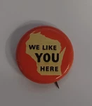 We Like You Here Pin Wisconsin 1-1/8" Orange Beige Vintage Vtg Round Circle. Fixed Price $9.00.